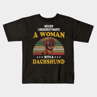 Never Underestimate A Woman With A Dachshund Kids T-Shirt